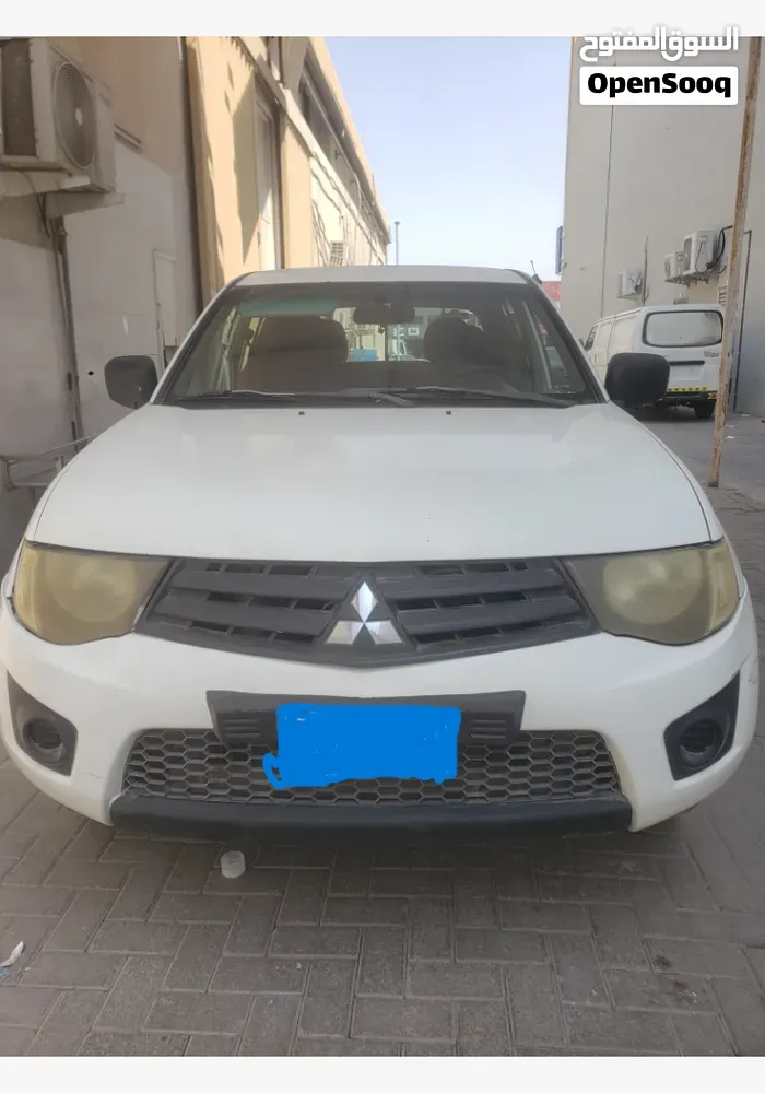 Mitsubishi L200 2011 photo 3