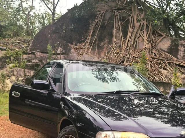 Nissan Presea 1999 photo 2