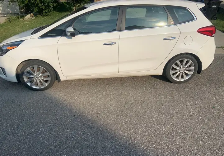 Kia Rondo 2014 photo 2