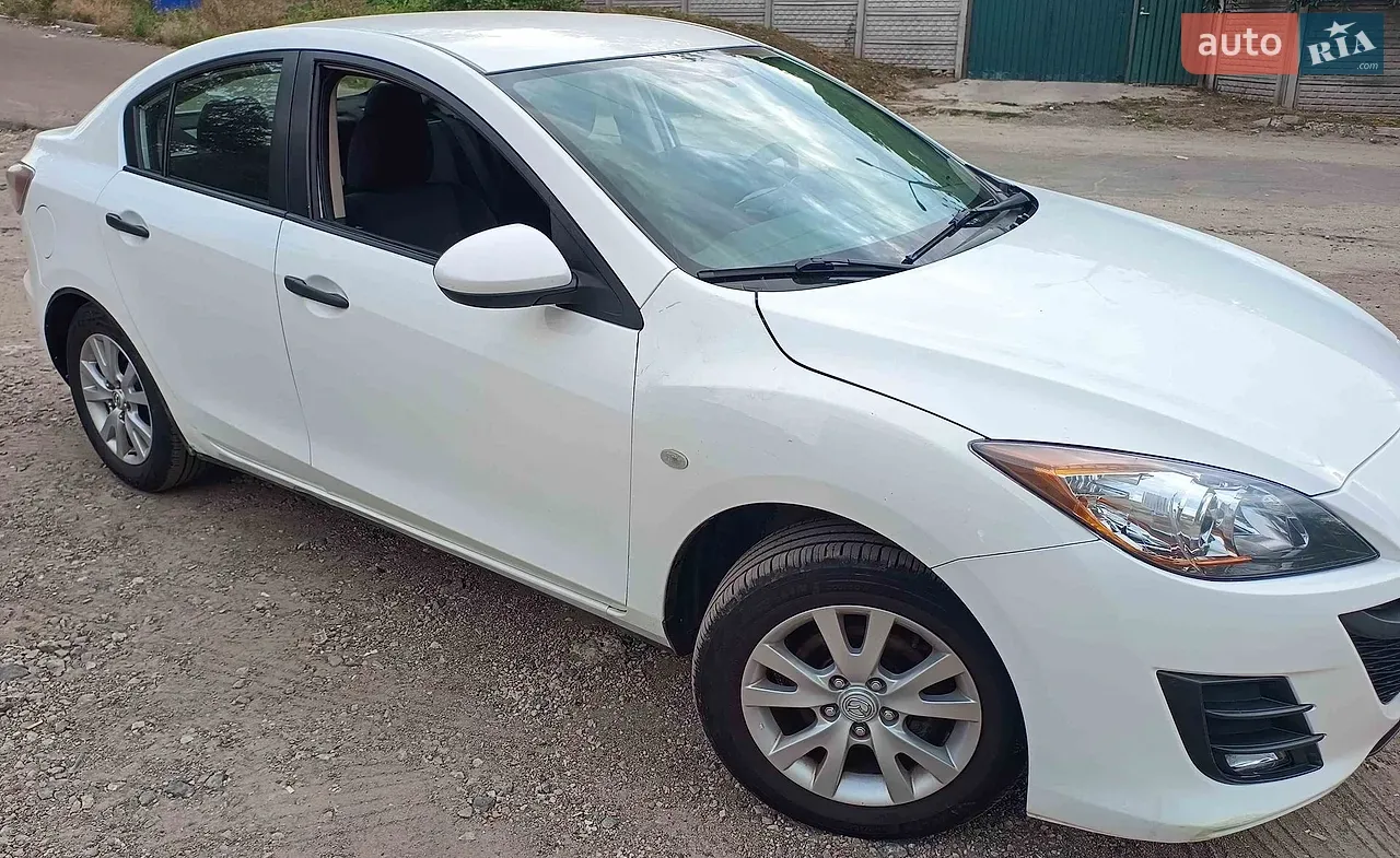 Mazda 3 2010 photo 4