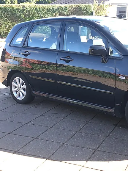 Suzuki Liana 2009 photo 3