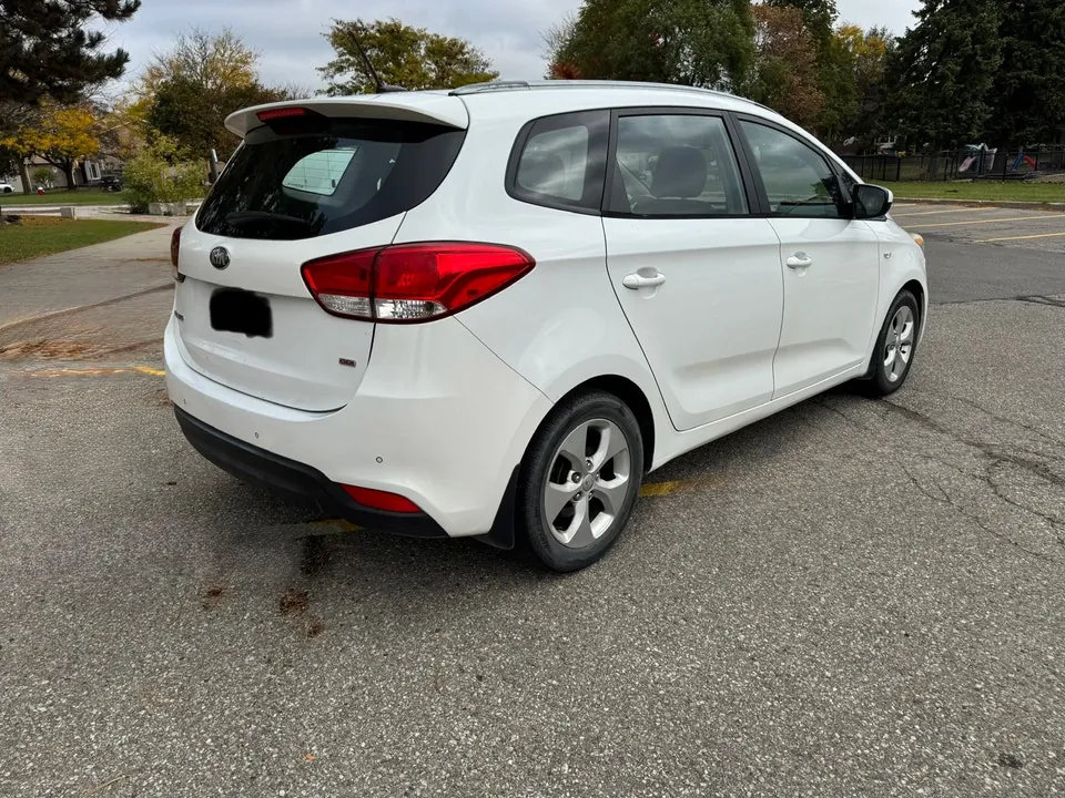 Kia Rondo 2014 photo 4