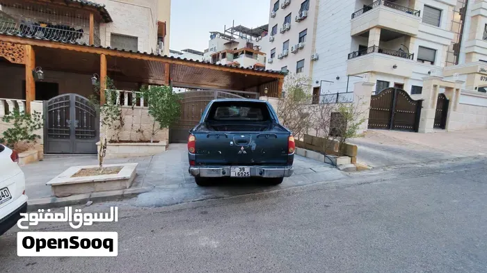 Mitsubishi L200 2009 photo 2