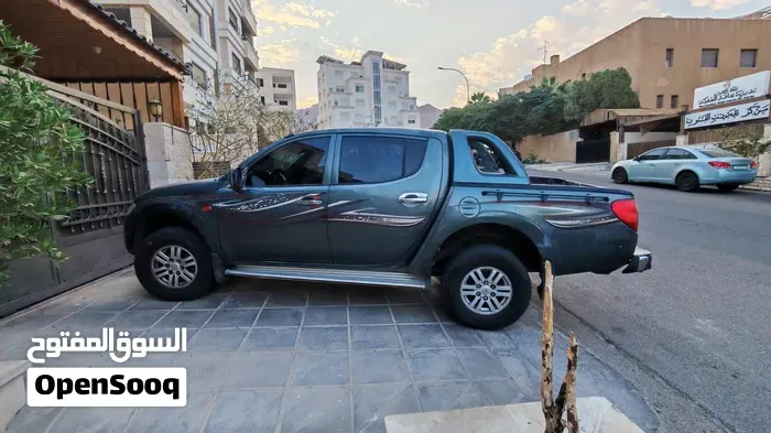 Mitsubishi L200 2009 photo 3