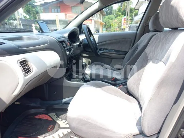 Nissan Sunny 2001 photo 2