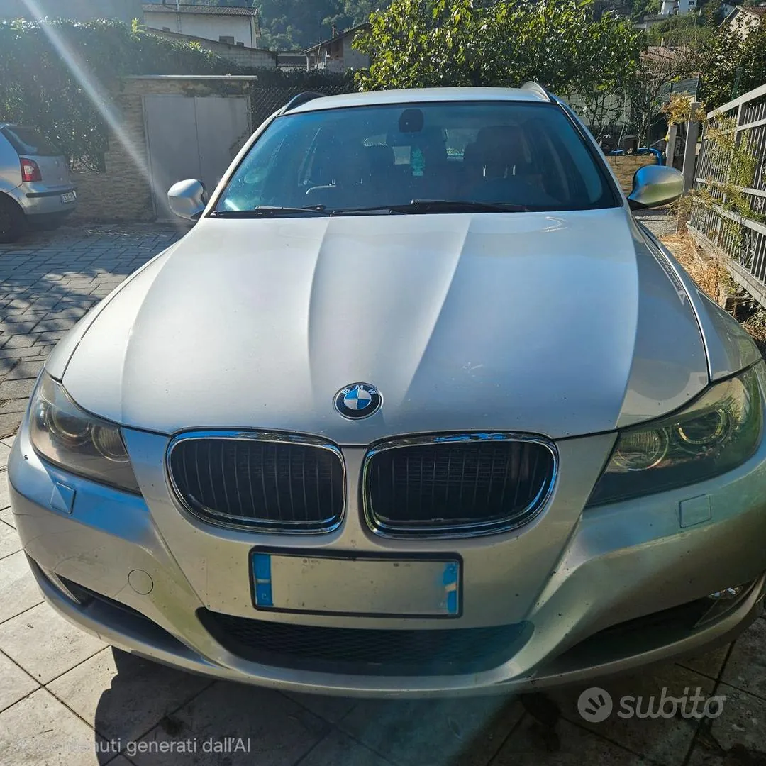 BMW 320D Touring 2010 photo 2