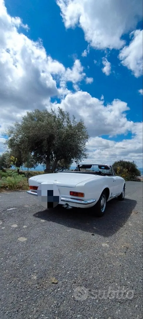 Fiat 124 Spider 1960 photo 3