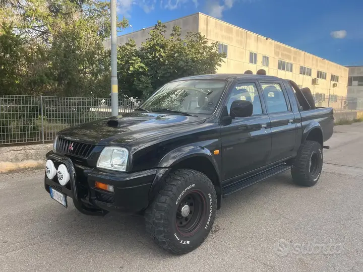 Mitsubishi L200 2003 photo 3