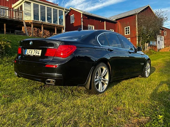 BMW 740D 2011 photo 5