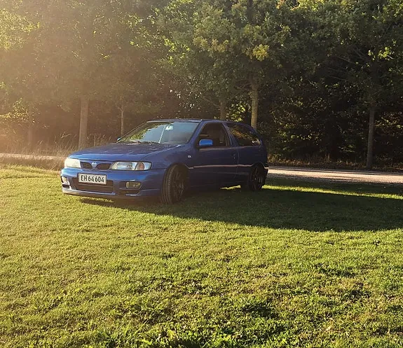 Nissan Almera 1997 photo 2