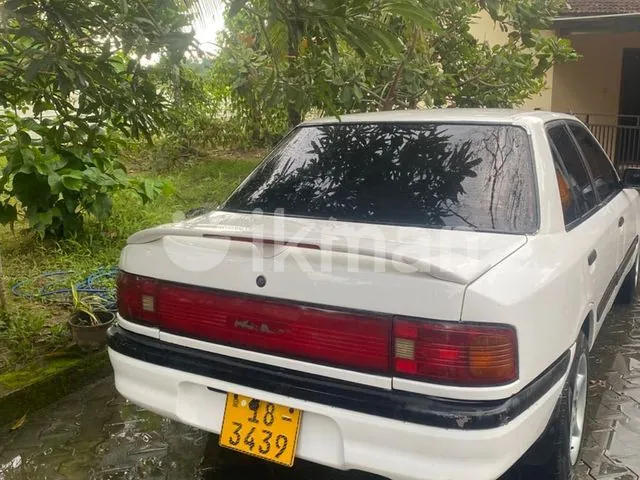 Mazda 3 1989 photo 3