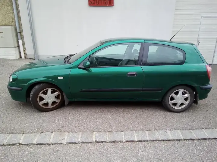 Nissan Almera 2000 photo 2