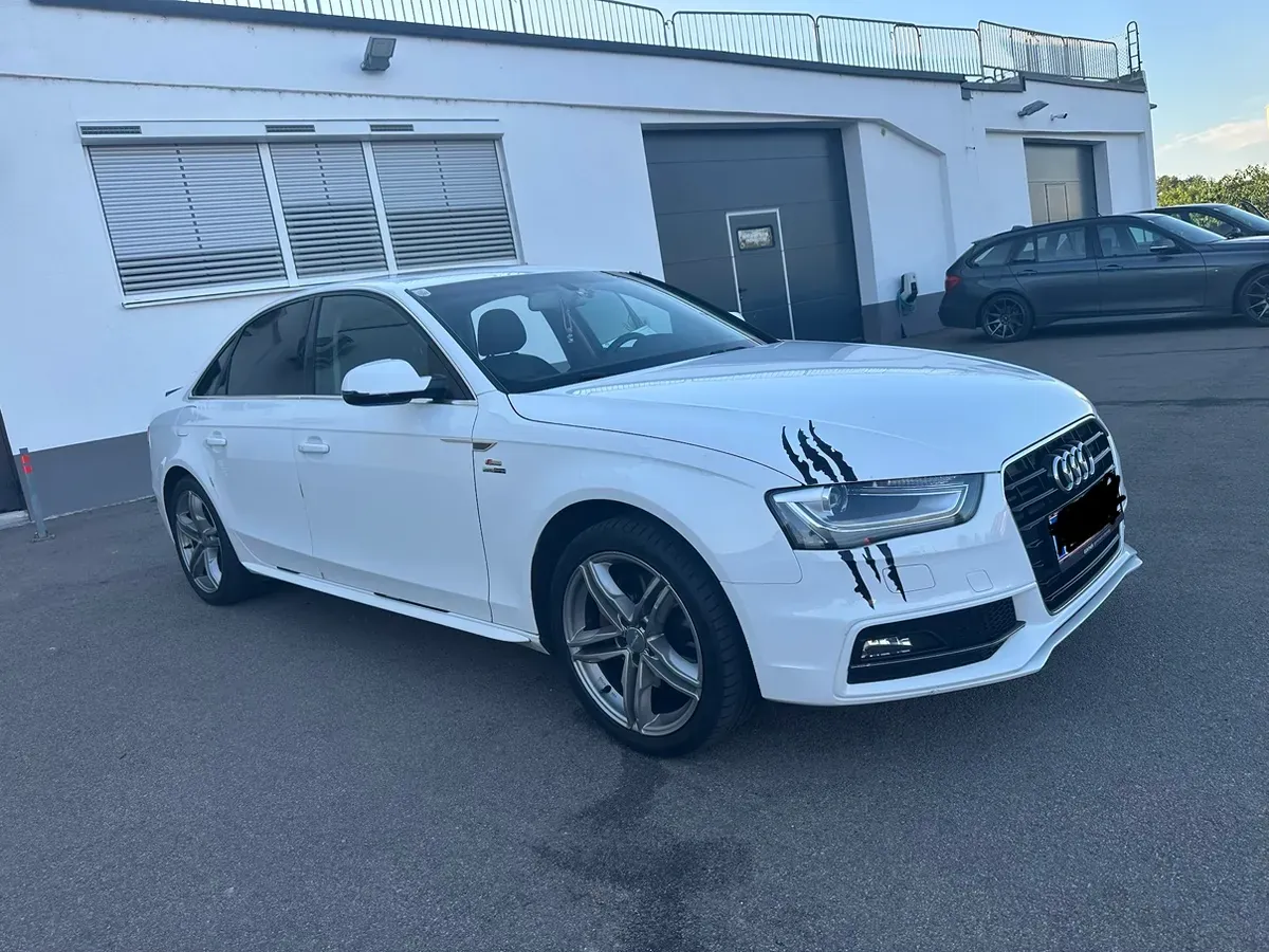 Audi A4 2014 photo 2