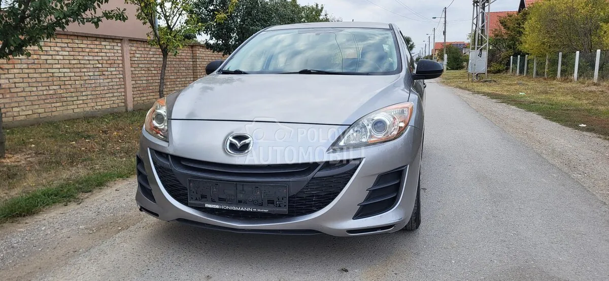 Mazda 3 2009 photo 3