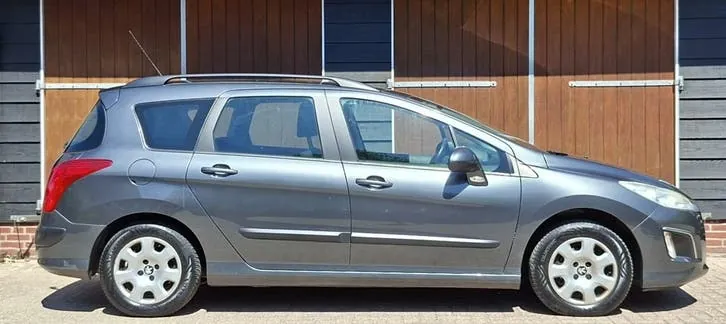 Peugeot 308 2011 photo 2