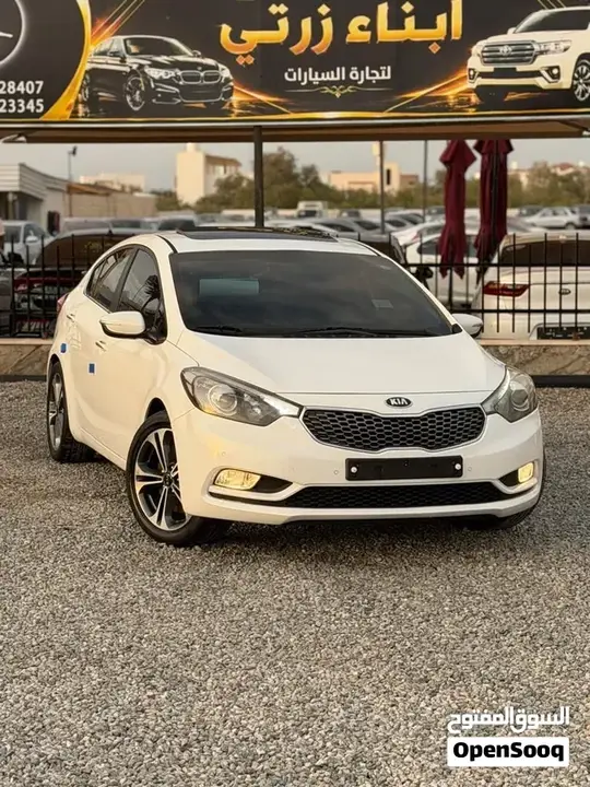 Kia K3 2014 photo 2
