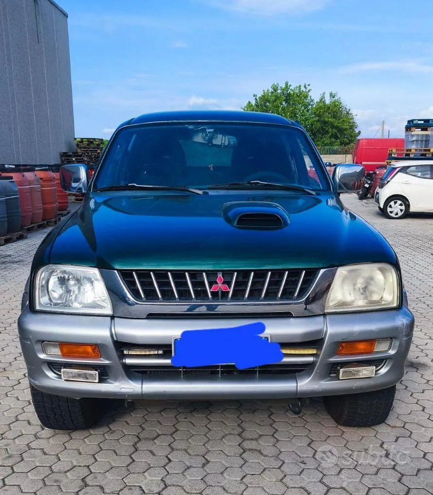 Mitsubishi L200 1999 photo 4
