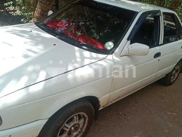 Nissan Sunny 1990 photo 2