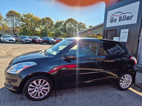 Suzuki Swift 2012 photo 2