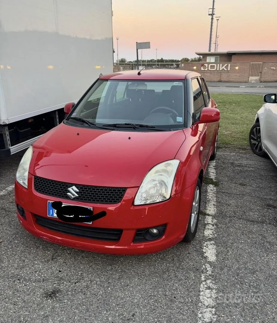Suzuki Swift 2010 photo 2