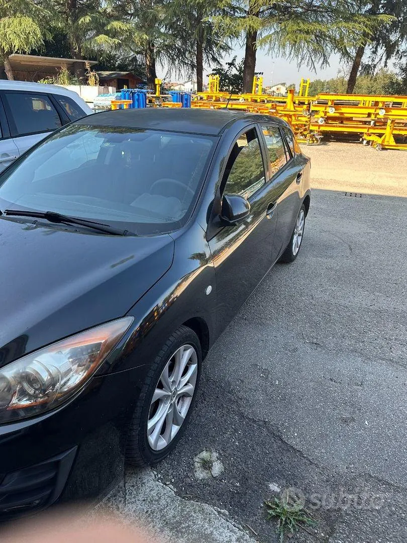 Mazda 3 2010 photo 2