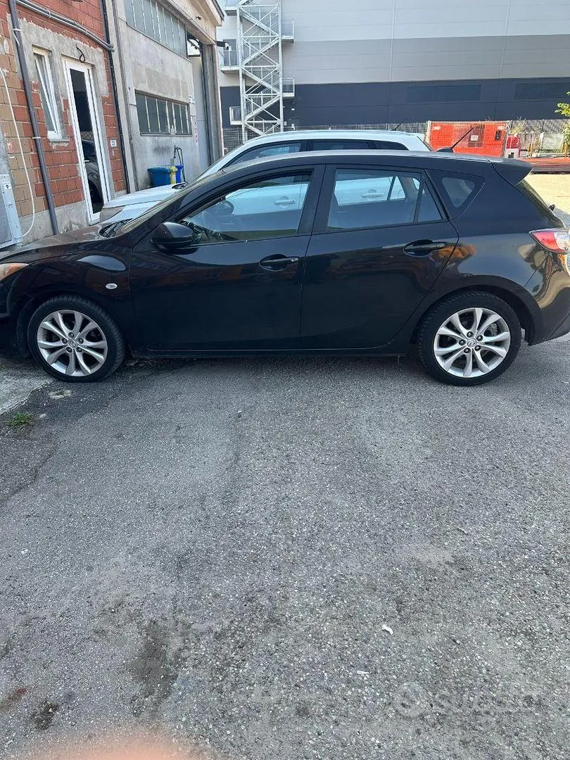 Mazda 3 2010 photo 3