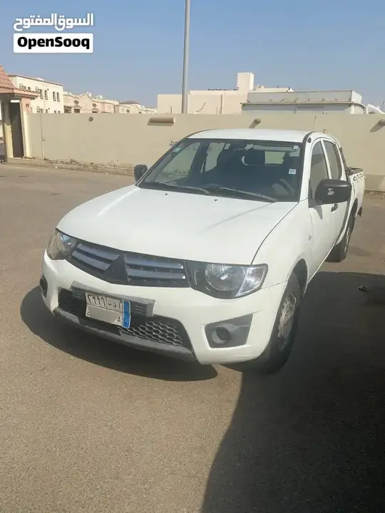 Mitsubishi L200 2010 photo 3