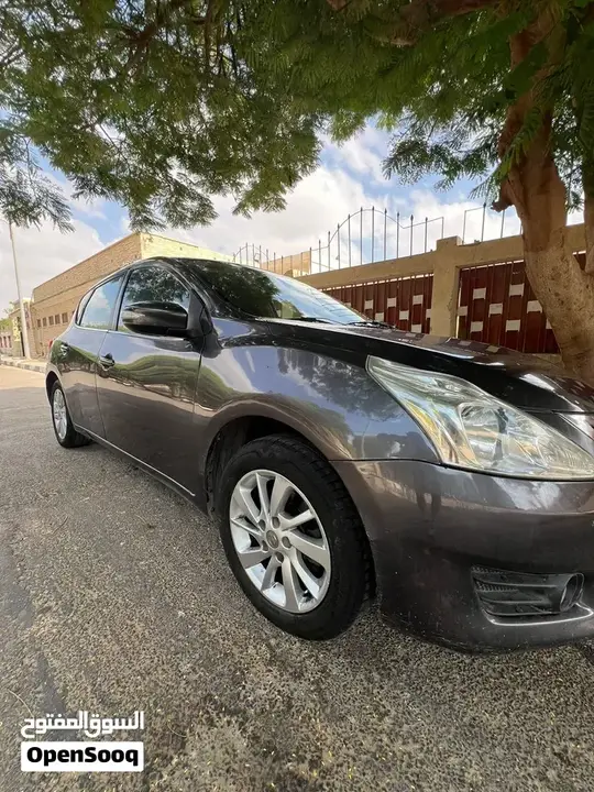 Nissan Tiida 2015 photo 2