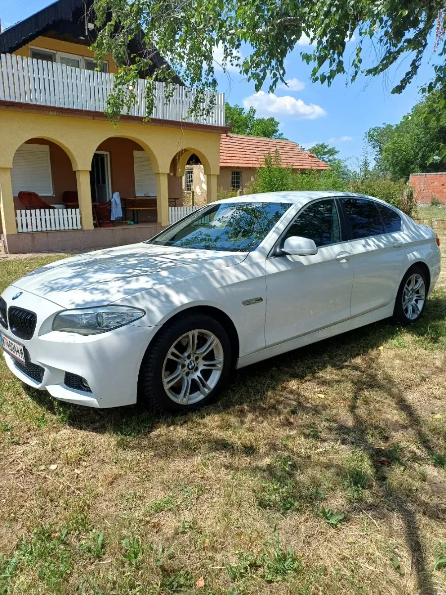 BMW 5 Series 2010 photo 2
