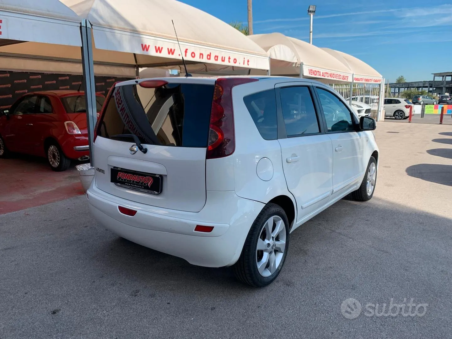 Nissan Note 2010 photo 4