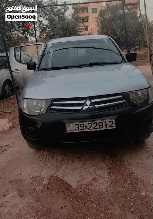 Mitsubishi L200 2011 photo 4