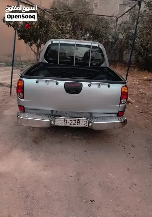 Mitsubishi L200 2011 photo 3