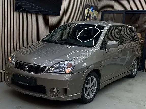 Suzuki Liana 2010 photo 2
