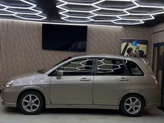 Suzuki Liana 2010 photo 5