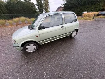 Daihatsu Cuore 1999 photo 2