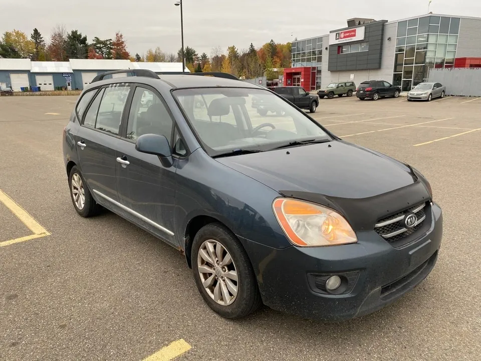 Kia Rondo 2010 photo 4