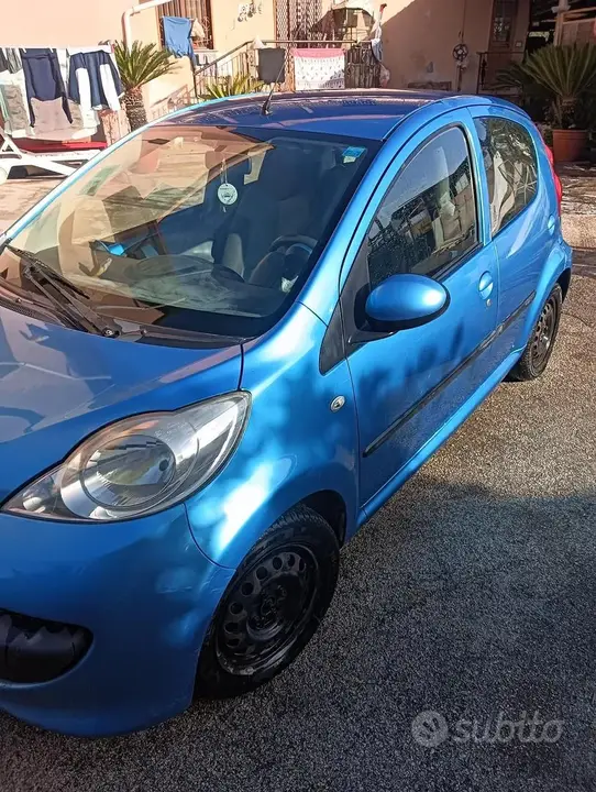 Peugeot 107 2008 photo 4