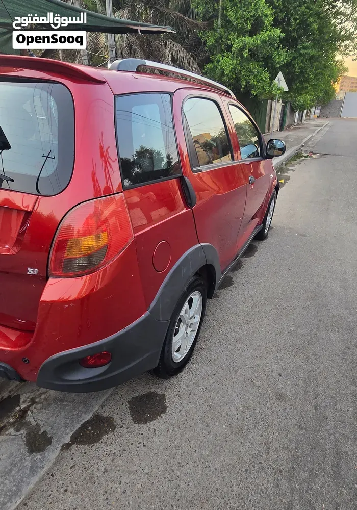 Chery X1 2014 photo 3