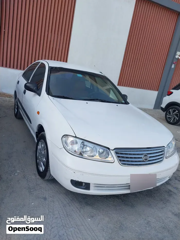 Nissan Sunny 2004 photo 2