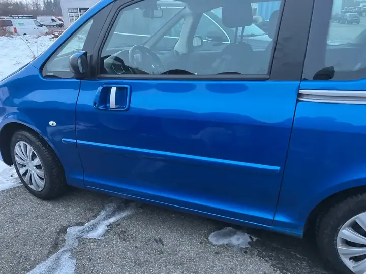 Peugeot 1007 2006 photo 2