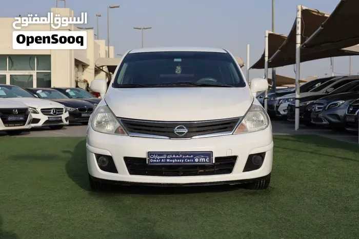 Nissan Tiida 2013 photo 2