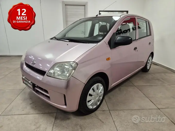 Daihatsu Cuore 2004 photo 3