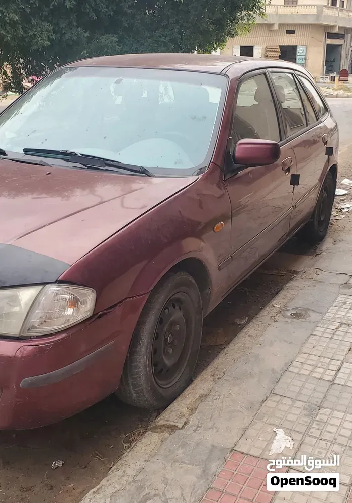 Mazda 323 2000 photo 2