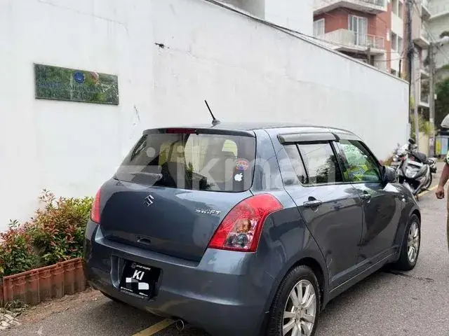 Suzuki Swift 2009 photo 2