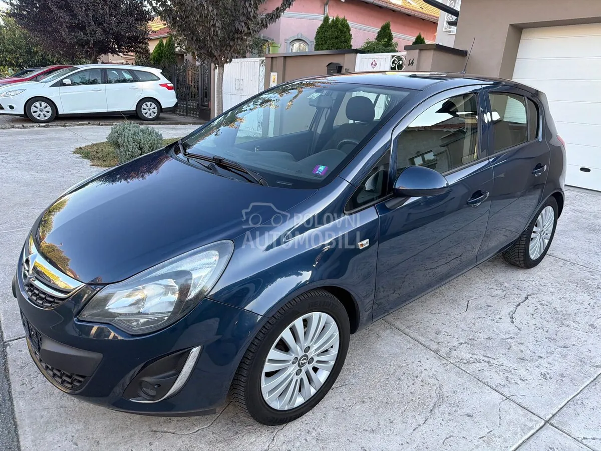 Opel Corsa D 2013 photo 2
