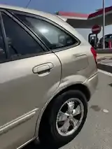 Mazda 323 2003 photo 5
