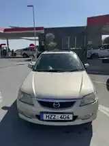 Mazda 323 2003 photo 2