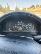 Mazda 323 2003 photo 3