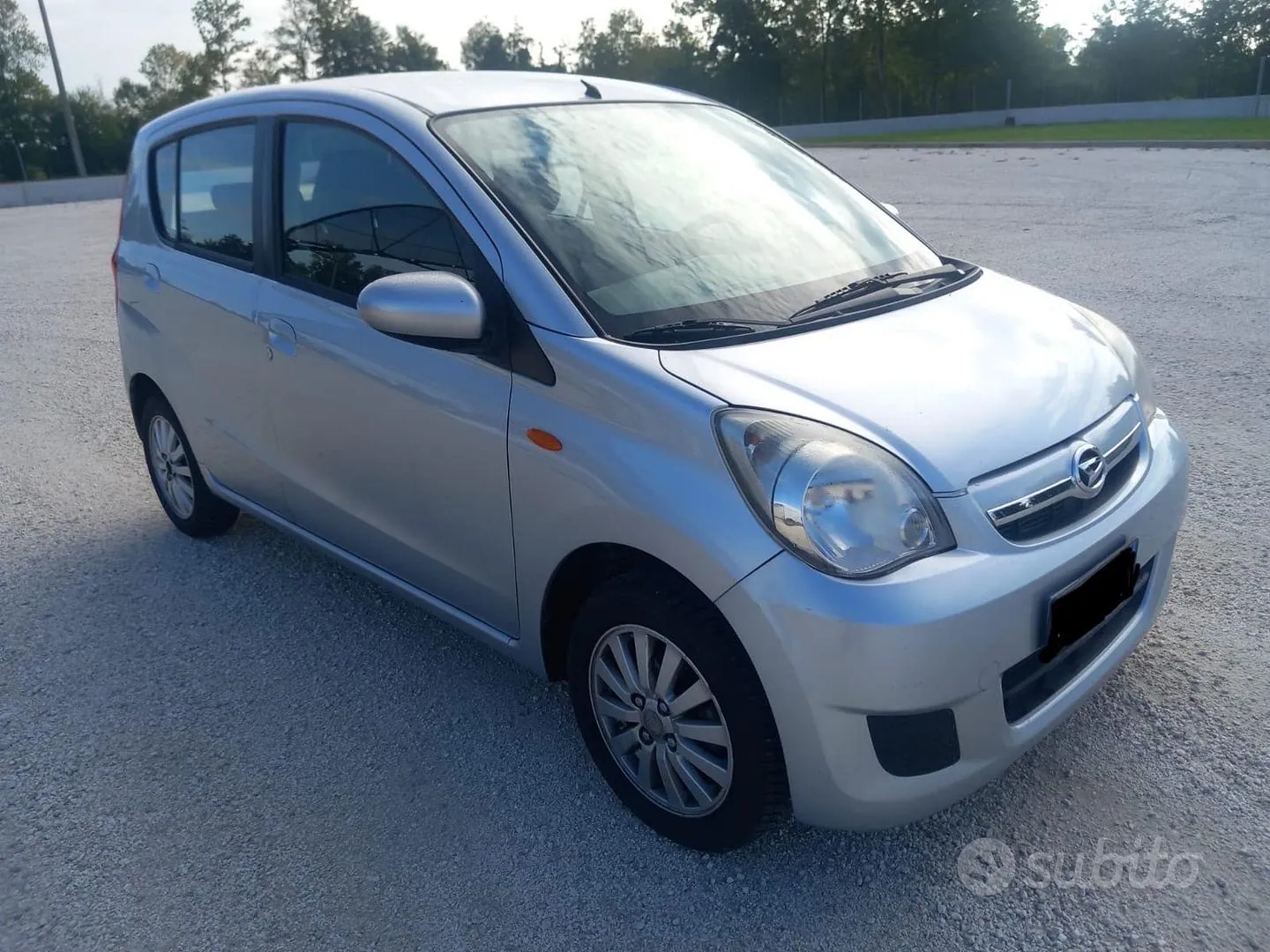 Daihatsu Cuore 2007 photo 3