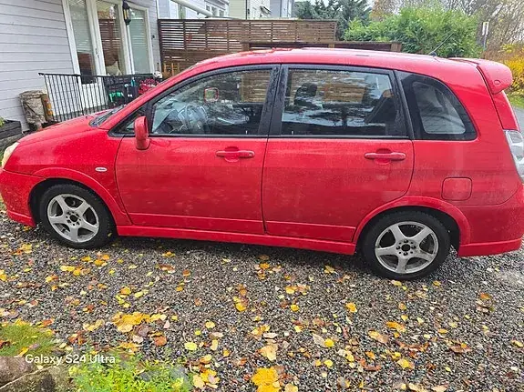 Suzuki Liana 2006 photo 2